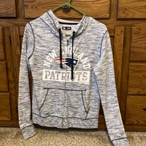 Mens/Womans New England Patriots zip up hoodie.